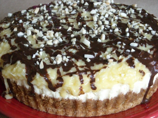 This German chocolate cheesecake is crazy delicious and full of vanilla, chocolate, coconut and cheesecake flavor. Say goodbye to boring cheesecake!