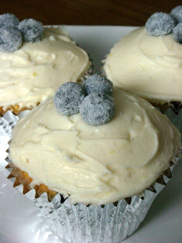 These lemon blueberry cupcakes are perfect balance of sweet and tart. Topped with lemon buttercream and homemade sparkly sugared blueberries.