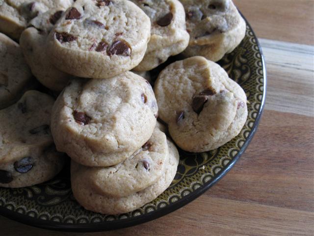 These little chewy chocolate chip cookies are perfect for snacking and milk dipping. Plus the base dough can be used for 5 different type of cookies!