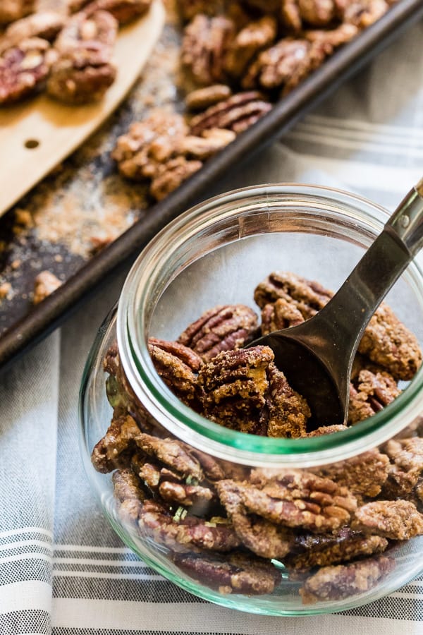 Sweet slow roasted praline pecans. Spiced with cocoa powder, cinnamon, sugar and just a touch of kosher salt. These nuts are perfect for snacking!
