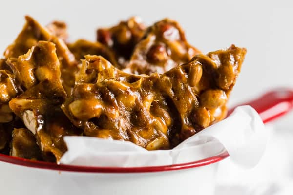 This homemade maple peanut brittle gives you all the flavor of traditional peanut brittle with a hint of maple flavor. It's the perfect holiday candy and a great addition to your holiday cookie tray. 