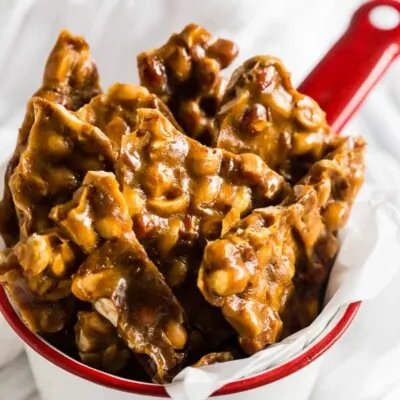 This homemade maple peanut brittle gives you all the flavor of traditional peanut brittle with a hint of maple flavor. It's the perfect holiday candy and a great addition to your holiday cookie tray. 
