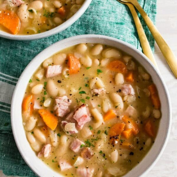 This quick and easy ham and bean soup is packed full of white beans, smoked ham, carrots, and onions. It's ready in just 30 minutes and a hearty way to use up all that leftover holiday ham. 