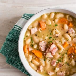 This quick and easy ham and bean soup is packed full of white beans, smoked ham, carrots, and onions. It's ready in just 30 minutes and a hearty way to use up all that leftover holiday ham. 