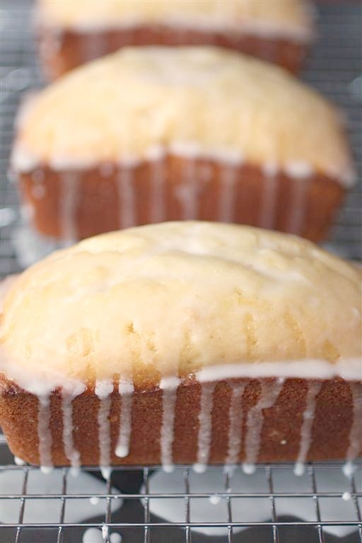 This lemon loaf cake is a delicious lemon cake, glazed with a lemon syrup and drizzled in a lemon glaze. If you like lemon this cake is for you!