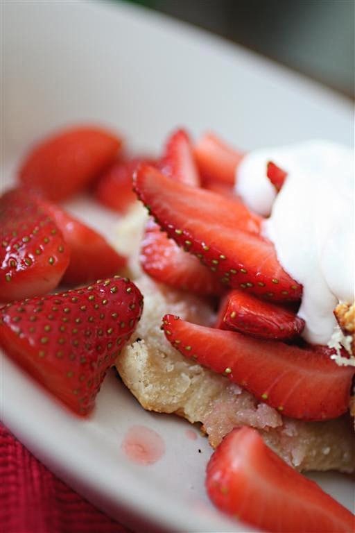 This strawberry shortcake is the perfect summertime dessert. Full of sweet strawberries, homemade biscuits and topped with whipped cream. 