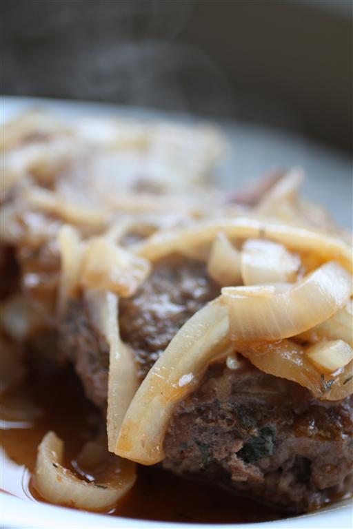Tender and delicious French onion Salisbury steak. Smothered in slow cooked onions, beef stock and red wine. Served with a side of cheese toast.