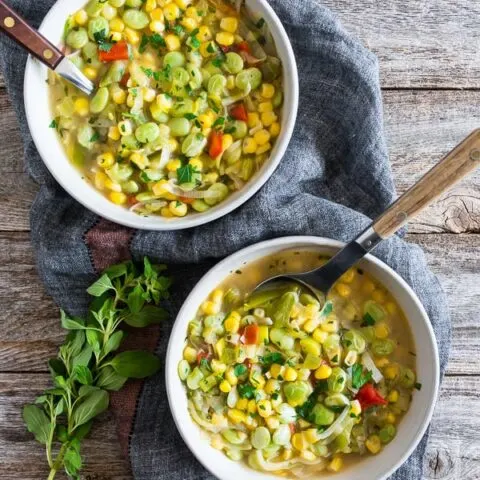 This super easy vegan and vegetarian succotash soup is packed full of lima beans, corn and fresh herbs. Ready in just 30 minutes and perfect for dinner or a light summer lunch. Trust me, you'll love this soup!