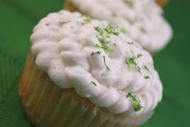 These margarita lime curd filled cupcakes are a drink in dessert form. Packed full of flavor, filled with homemade lime curd and topped with lime zest frosting.