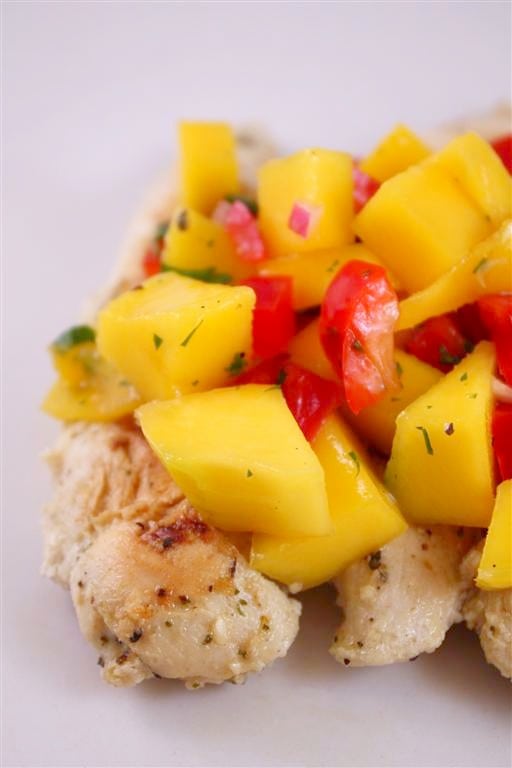 This mango salsa chicken combined fresh grilled chicken and tops it with a homemade mango salsa. It's packed with mango, pepper, cilantro and lime. 