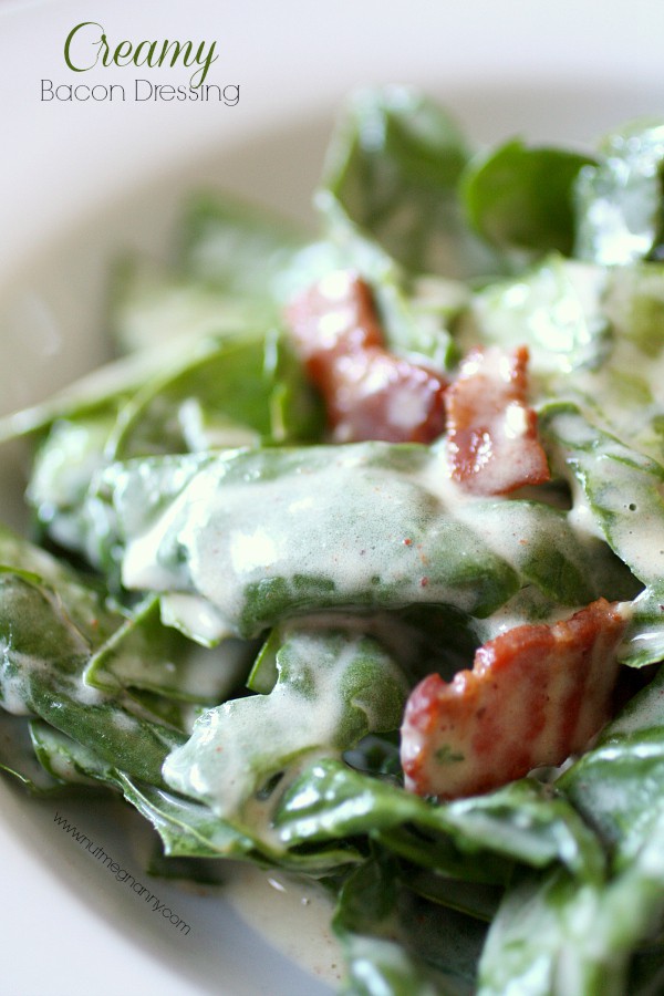 Creamy Bacon Dressing and Greens salad in a bowl. 