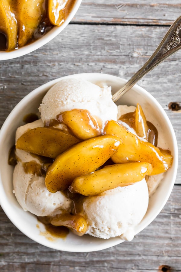 Vanilla Spiced Apples spooned over ice cream. 