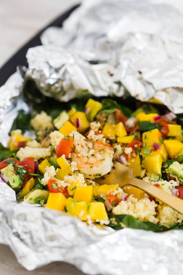 Shrimp Couscous Packets with avocado mango salsa in foil 