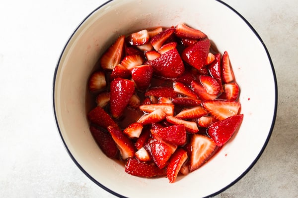 cut strawberries in a large bowl