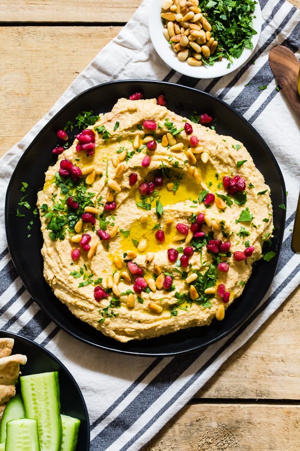 This tahini free lemon hummus is packed full of cashew butter, chickpeas and lots of lemon and garlic flavor. Perfectly smooth and perfect for dipping with toasted pita or crunchy vegetables. 