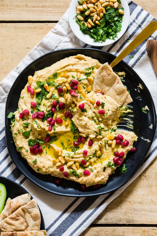 This tahini free lemon hummus is packed full of cashew butter, chickpeas and lots of lemon and garlic flavor. Perfectly smooth and perfect for dipping with toasted pita or crunchy vegetables. 