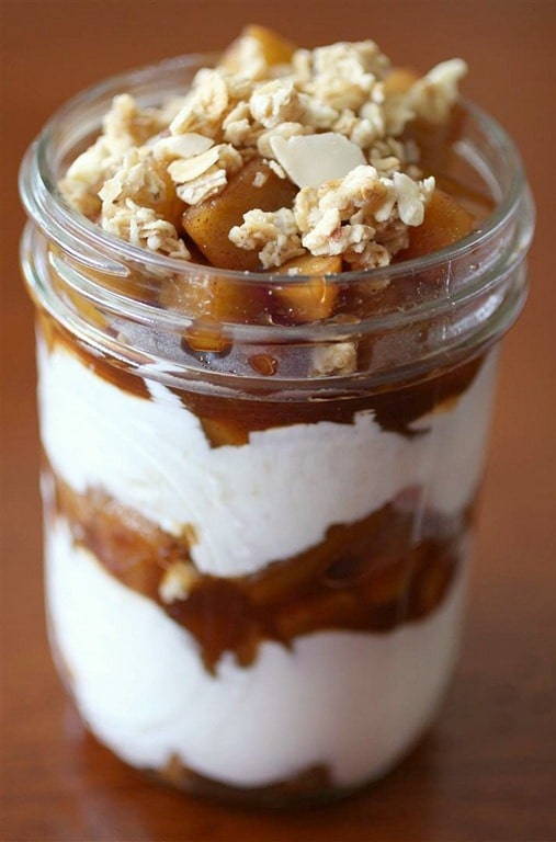 This apple maple parfait is packed full of vanilla, apple and maple flavor. Sweet layers of yogurt, granola and maple cinnamon apples are the perfect breakfast.
