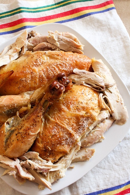 This classic roast chicken turns out perfect every single time. Stuffed with lots of fresh lemon, rosemary, thyme, sage and seasoned with just salt and pepper. It's classic flavors at it's best. 