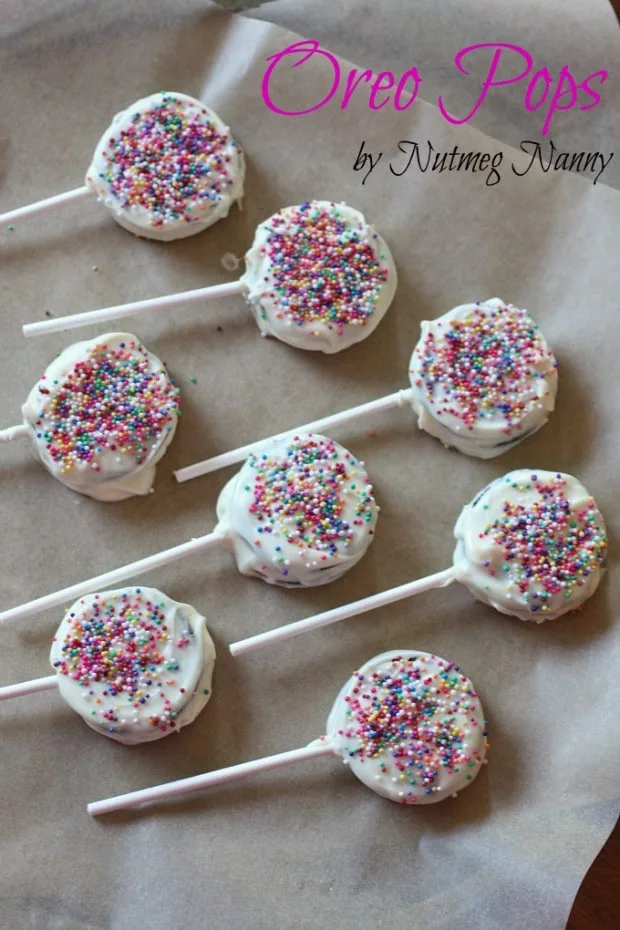 Oreo Pops covered in white chocolate and sprinkles. 