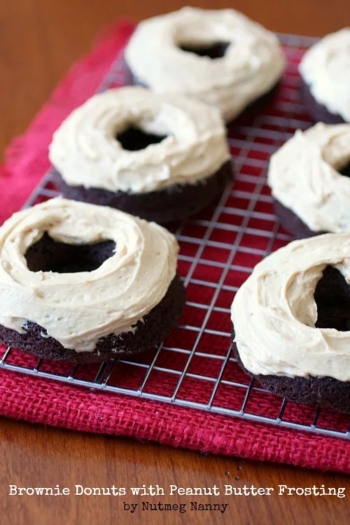 These brownie donuts with fluffy peanut butter frosting are the best dessert for your chocolate peanut butter fix. The brownies are rich and the frosting is fluffy and light.