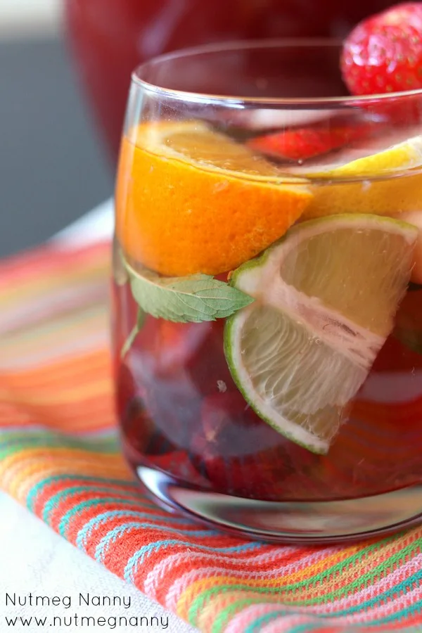 This sparkling summer sangria is packed full of fresh fruit, orange liqueur and pink sparkling wine. Welcome summer with this sweet cocktail! You'll love it!