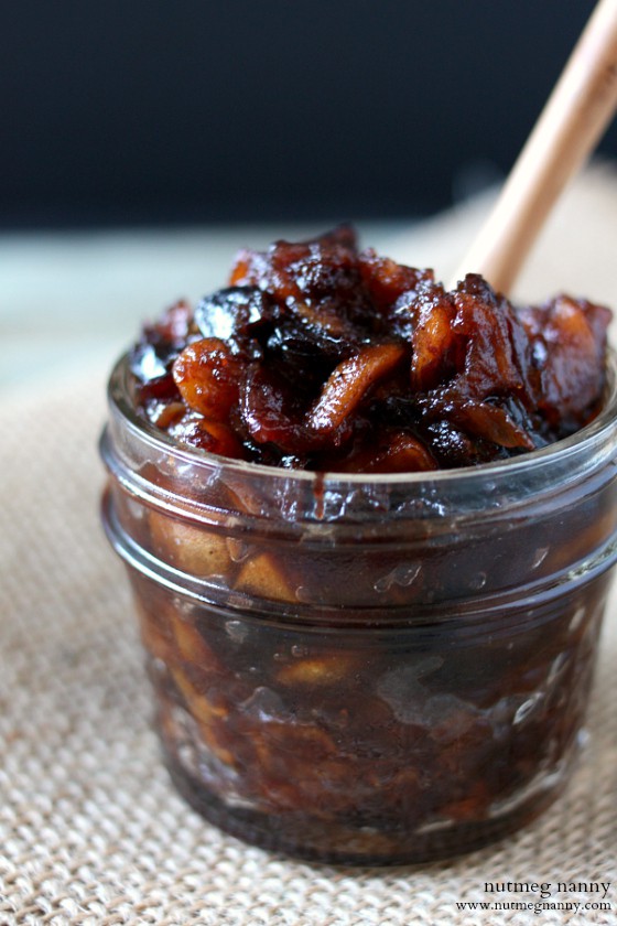Spiced Apple Chutney in a bowl with a spoon. 