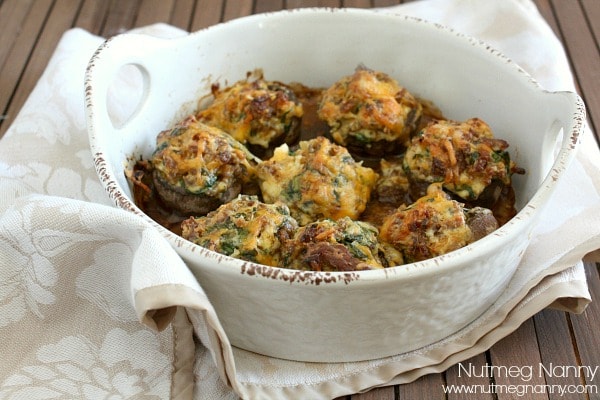 These sausage and spinach stuffed mushrooms are perfect for any holiday party or easy weeknight meal. So easy to make and ready in under and hour.