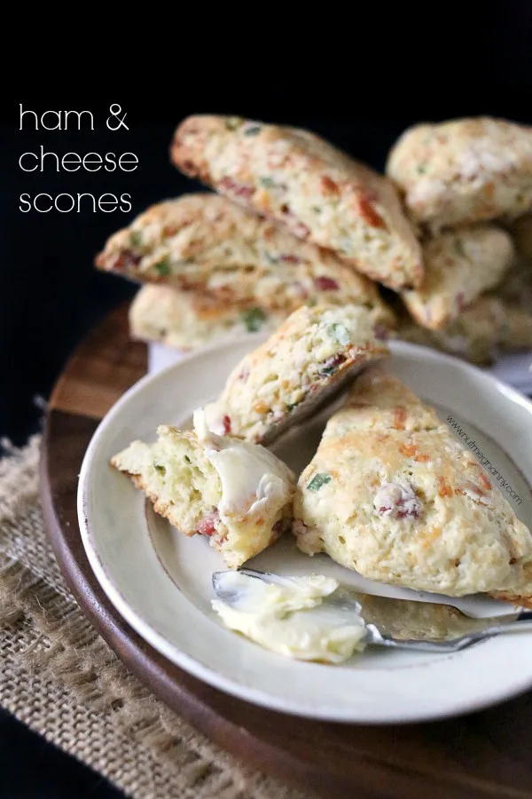 Ham and Cheese Scones on a plate with butter. 
