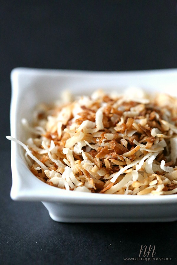 Toasted coconut in a small bowl. 
