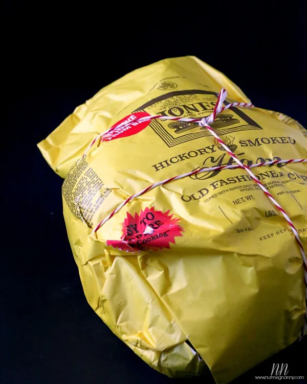 Pineapple Bourbon Butter Glazed Ham wrapped in a bag. 