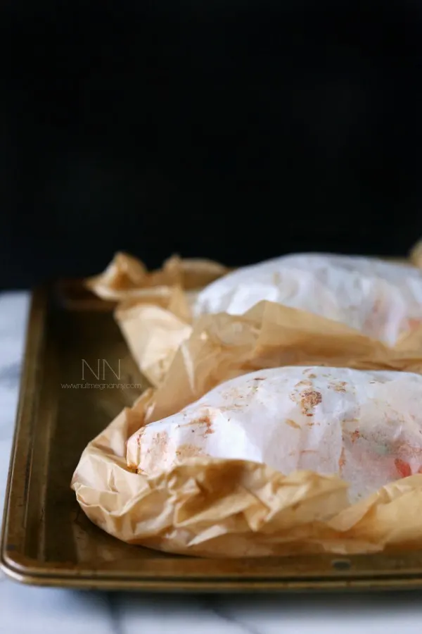 Mahi Mahi En Papillote wrapped in parchment paper. 