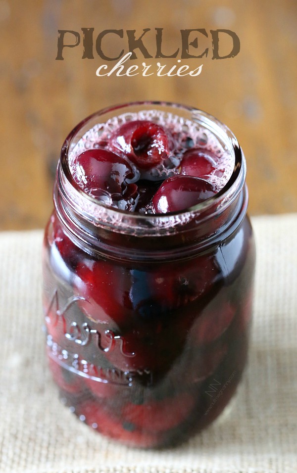 pickled cherries in a glass quart jar