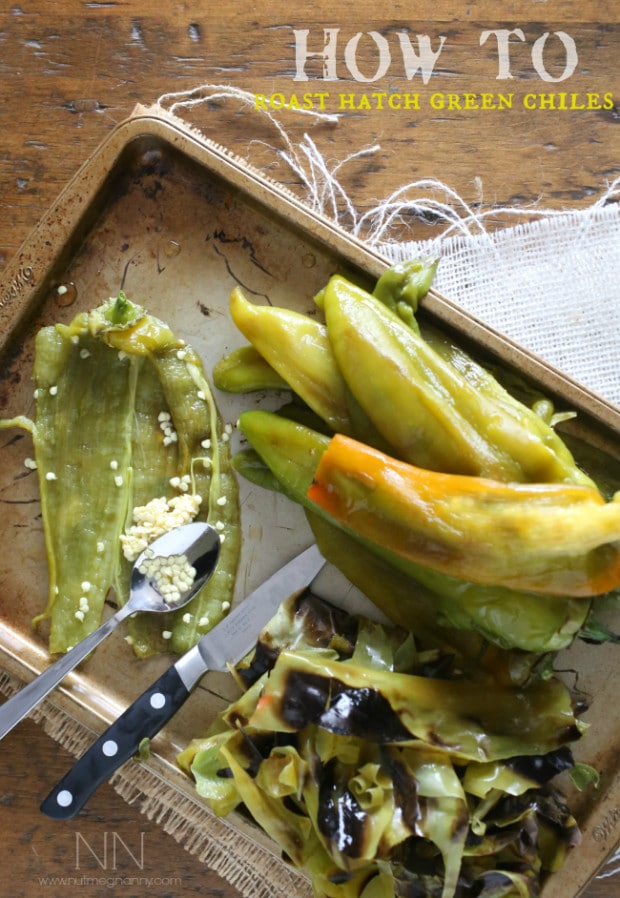 peeled roasted hatch green chiles on a baking sheet