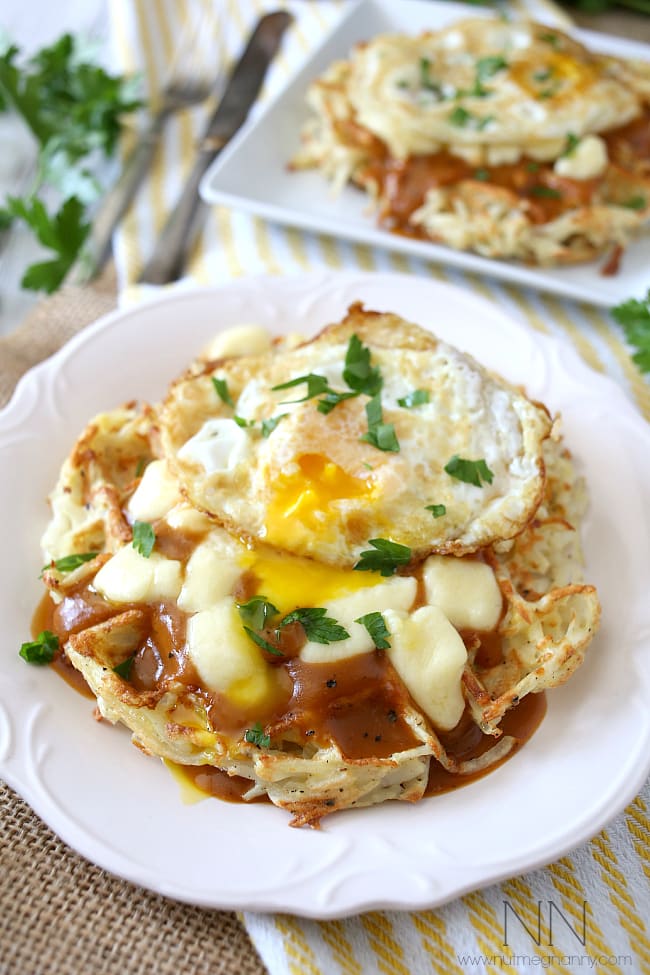 These crispy poutine hash brown waffles are the perfect way to start the day. Crispy potato waffles, homemade gravy, cheese curds and a fried egg. Hello breakfast!