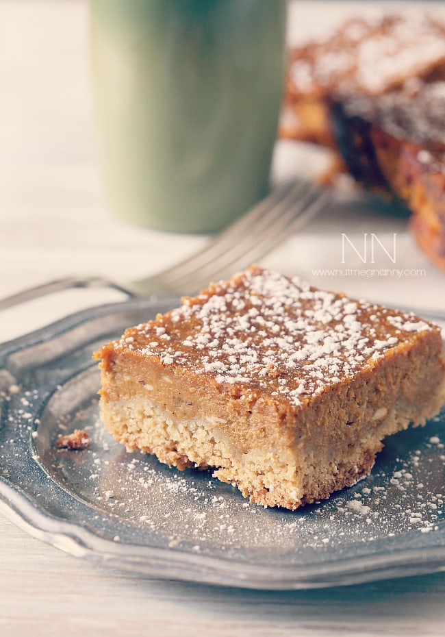 These pumpkin pie cake bars are like two desserts in one. Cake like bottom topped with a moist pumpkin pie top sprinkled with powdered sugar. Perfect for Thanksgiving!