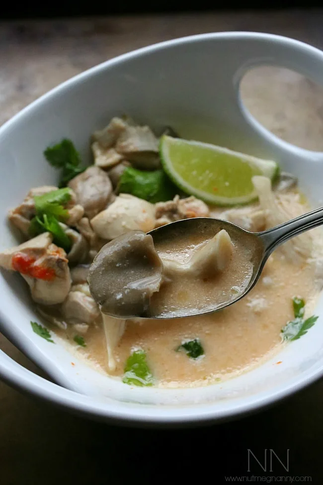 This Thai tom kha gai soup is a beautiful combination of chicken, mushrooms, ginger, lemongrass and coconut milk. Top with sriracha, cilantro and just a squeeze of lime. 