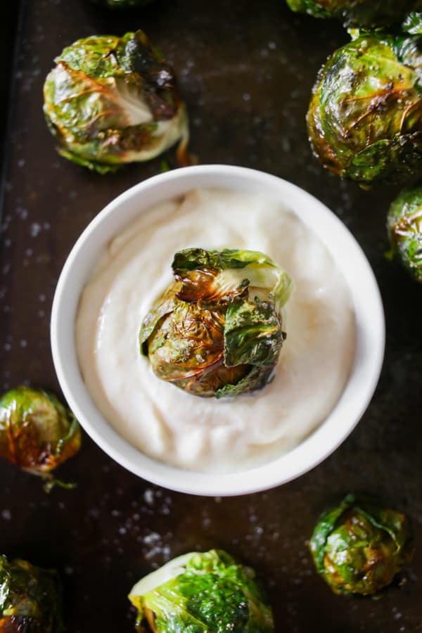 on the stalk roasted brussels sprouts dipped in garlic mayonnaise
