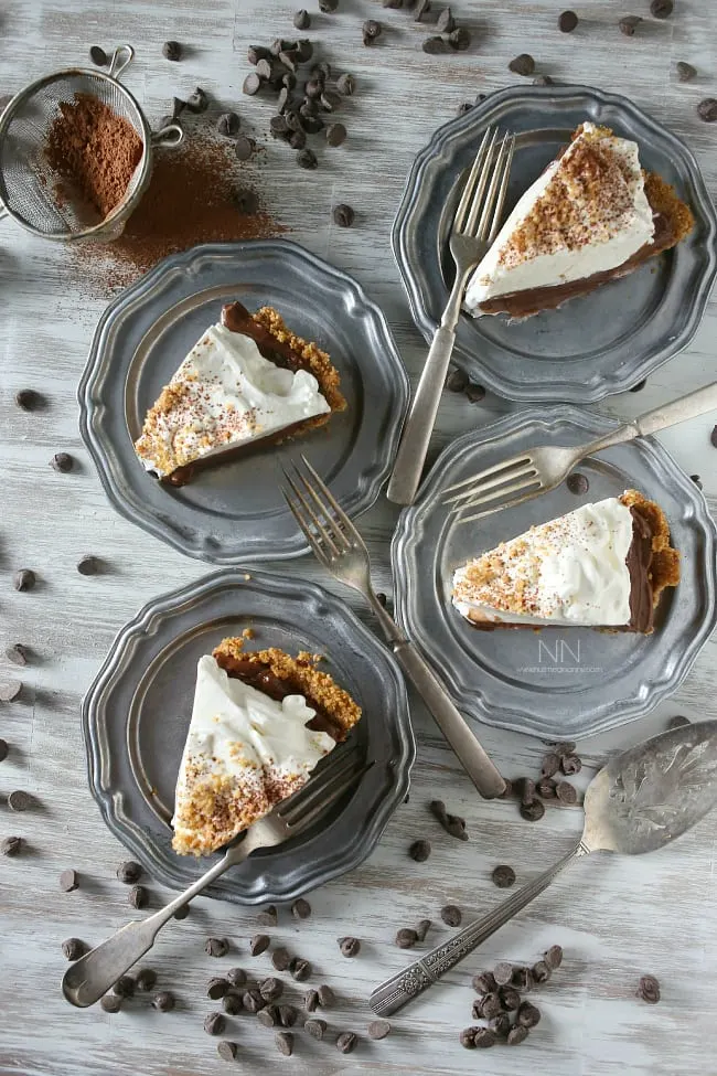 This super simple chocolate orange pudding pie is a breeze to make! Crazy delicious chocolate orange pudding packed into a pretzel crust. It's the perfect sweet and salty bite!