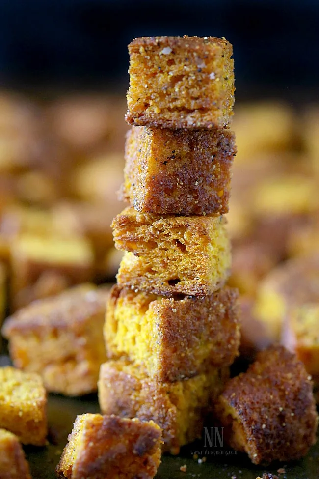 These simple pumpkin cornbread croutons are made from homemade pumpkin sage cornbread and are ready in just minutes! Perfect on soup, salad or in stuffing.