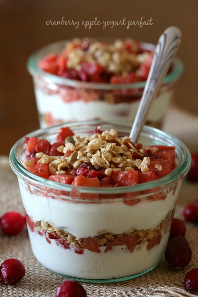 These cranberry apple yogurt parfaits are the perfect addition to your holiday breakfast menu. Easy to make and full of fresh fruit, crunchy granola and tangy Greek yogurt. 