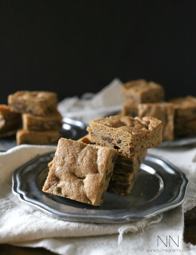 These peanut butter stuffed chocolate chip cookie bars are  bursting with lots of peanut butter deliciousness. Serve warm with a big glass of cold milk. 