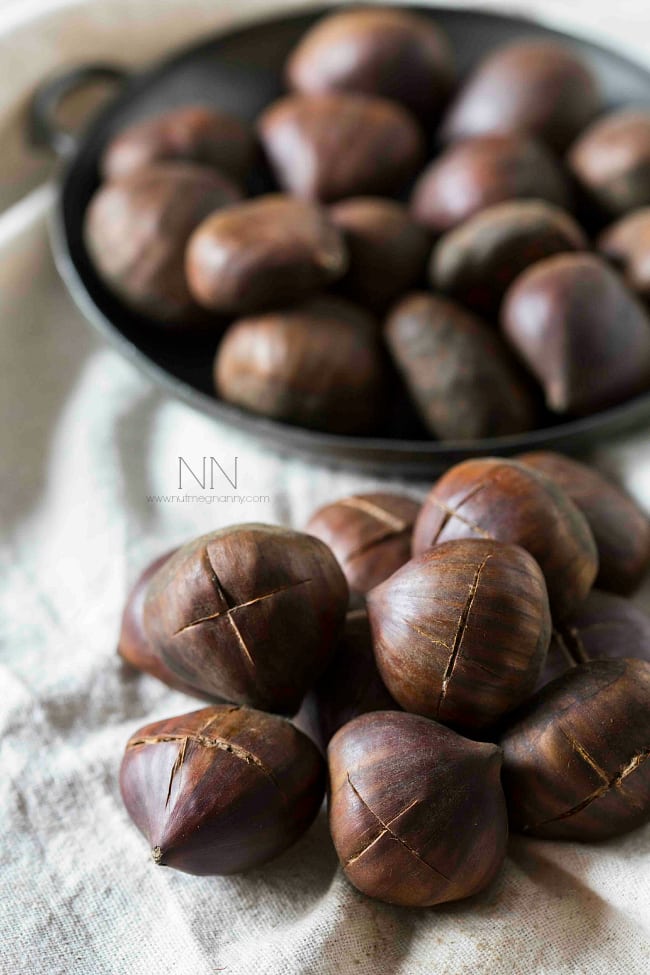 Roasting you own chestnuts isn't hard! Not only do I show you how but I give you a sweet recipe for spice butter roasted chestnuts as well. Hello Christmas!