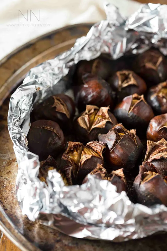 Spice Butter Roasted Chestnuts on a sheet pan. 
