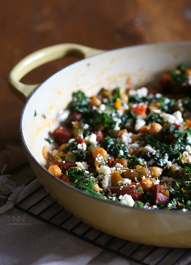 This chorizo chickpea skillet is packed full of spicy chorizo sausage, chickpeas, kale, sweet bell peppers and cotija cheese. Full of flavor, nutritious vegetables and perfect for cold winter days.