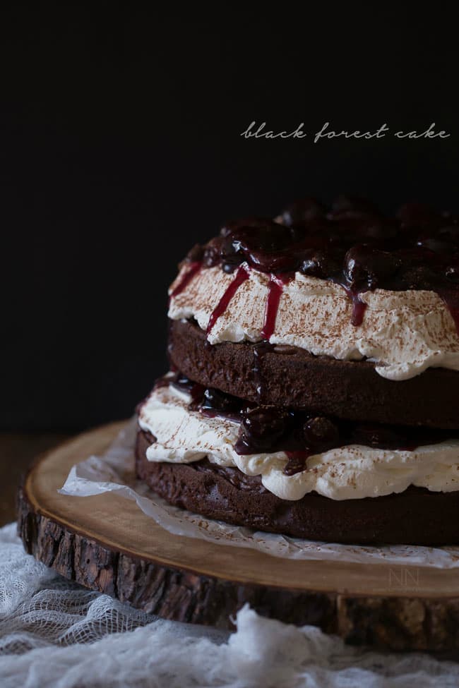 This black forest cake is the perfect showstopper of a dessert. It combines moist chocolate cake, homemade cherry filling and mascarpone whipped cream.