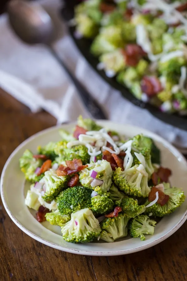 This super simple broccoli bacon salad is creamy, crunchy and packed full of flavor. A delicious mixture of broccoli, bacon, red onion, mozzarella cheese and creamy homemade dressing. Say hello to your new favorite salad!