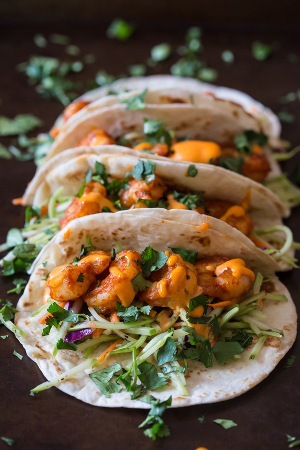 These chipotle shrimp tacos are the perfect balance of sweet and spicy. Flour tortillas topped with tangy broccoli slaw, spicy shrimp and flavorful gochujang mayonnaise.