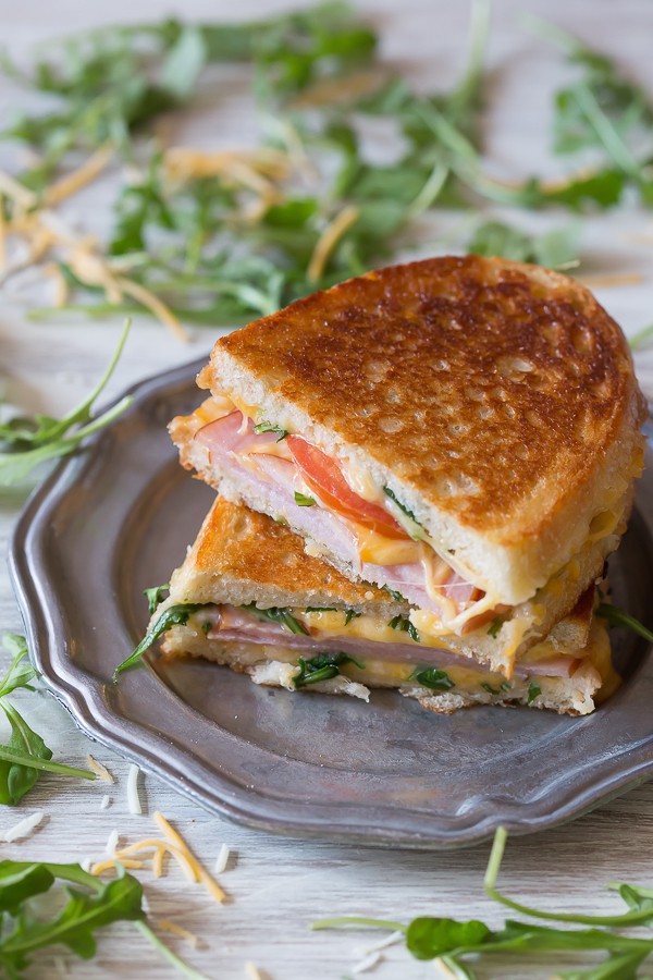 This totally cheesy Canadian BLT Grilled Cheese is stuffed with cheese, arugula, tomato and Canadian bacon. It's toasted till perfection and ready in no time!