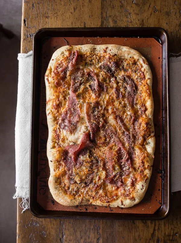 This delicious parmesan prosciutto pizza is packed full of flavor and ready in just 30 minutes. Why order take out when you can easily make it at home? Super simple and super delicious!