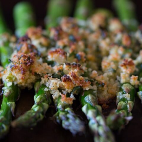 This asparagus gratin takes fresh asparagus and tops it with lemon, herb and sharp Parmesan cheese panko bread crumbs. This side dish is spring time perfection.